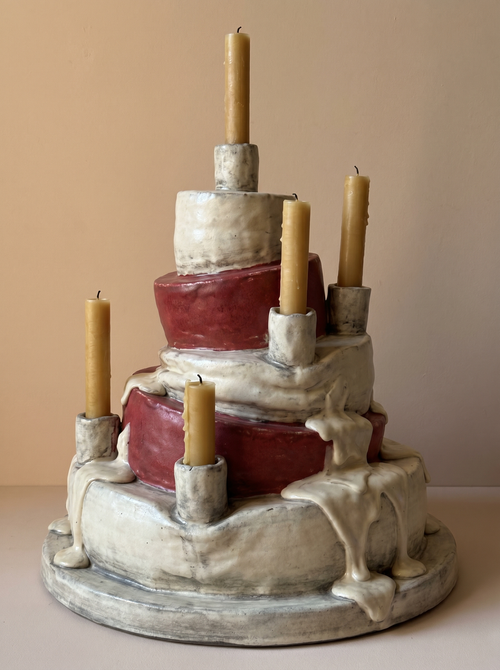 Generational Wealth — tiered melting wedding-cake ceramic candelabra